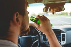 Picture of man drinking and driving