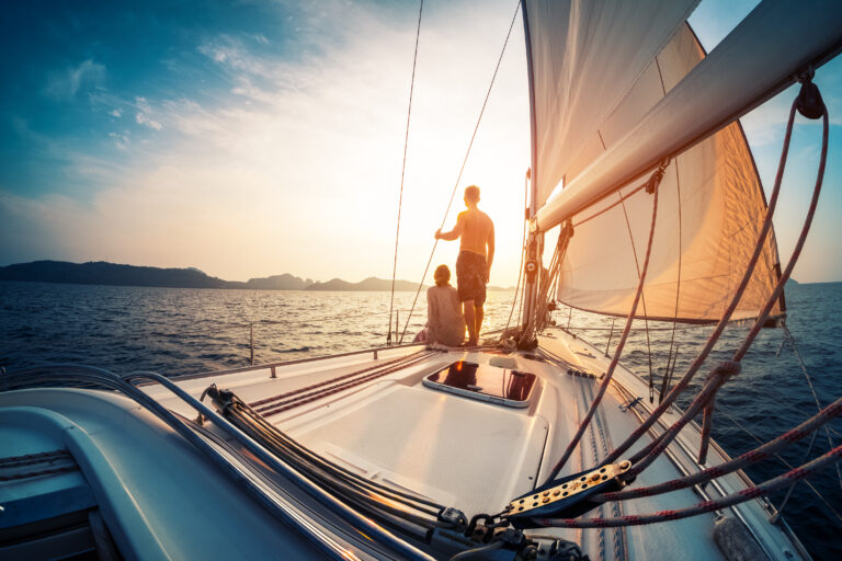 Picture of a couple on a boat at sunset