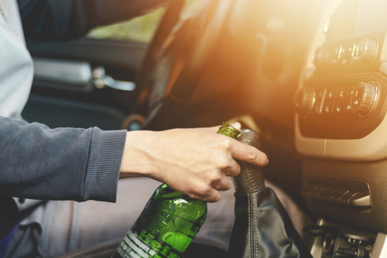 Person drinking and driving